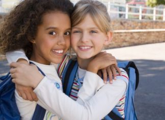 Happy schoolgirls