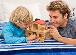 Dad and son playing