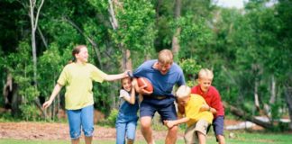 Family playing football