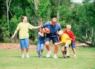 Family playing football