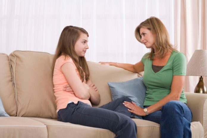 Mother and daughter talking