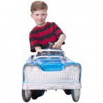 Boy in toy car