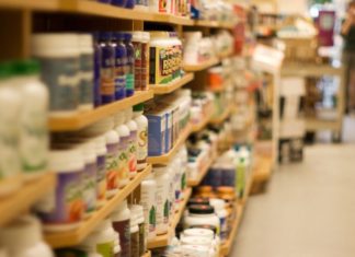 Rows upon rows of supplements in a shop.