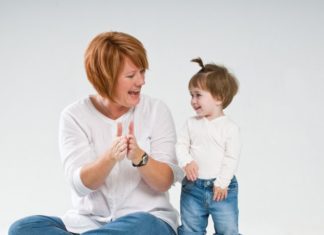 Candid studio shot of mother and daughter