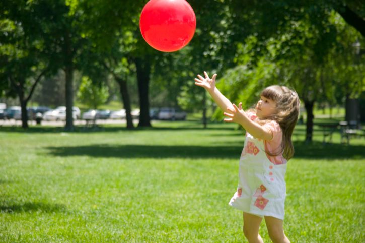 Girl catching ball
