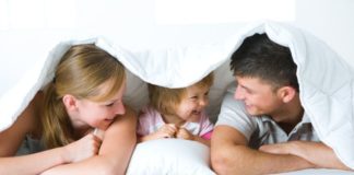 Family under blanket