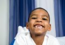 Portrait of smiling boy with missing front teeth