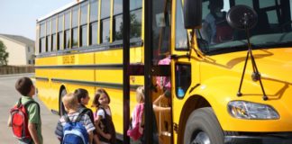 Kids boarding school bus