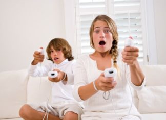 Kids playing Nintendo Wii