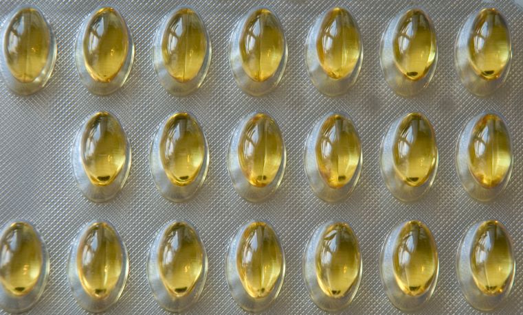 A package of yellow gel filled capsules