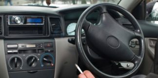 Man smoking in car