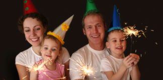 Family of four with sparklers