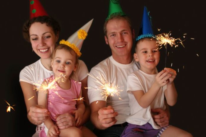 Family of four with sparklers