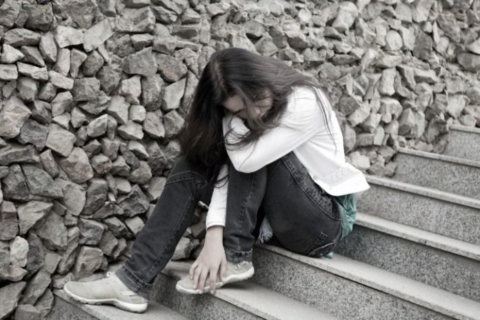 Young woman alone in the city.