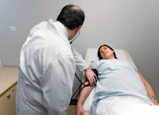 Pregnant woman receives a checkup