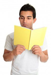 Man reading from a book