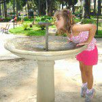 Girl at fountain