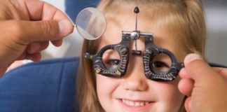 Girl getting eye exam