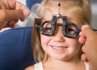 Girl getting eye exam