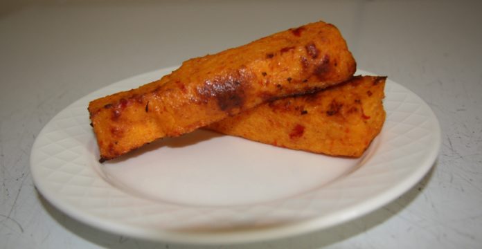 Two sticks of sliced polenta.