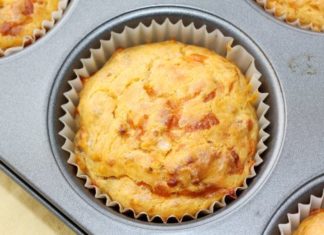 Single baked muffin, still in tray.