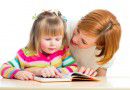 Woman and daughter reading