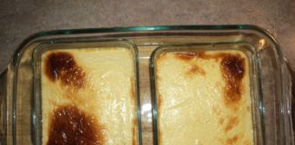 Freshly baked custard. Two smaller casserole dishes sit inside a larger dish.