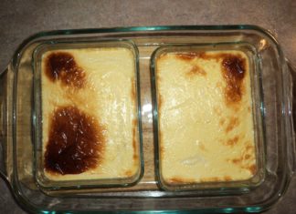 Freshly baked custard. Two smaller casserole dishes sit inside a larger dish.