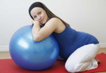 Woman and exercise ball