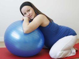 Woman and exercise ball