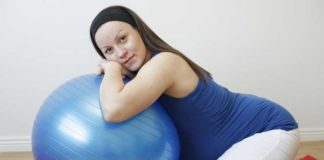 Woman and exercise ball