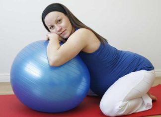 Woman and exercise ball