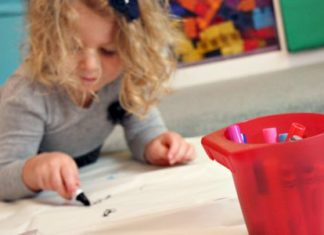 girl-floor-painting-wrapping-paper