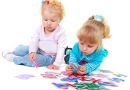 girls_playing_alphabet_letters_300x250