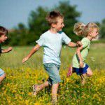 Kids running in flowers