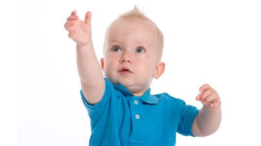 Toddler grabbing with his hand