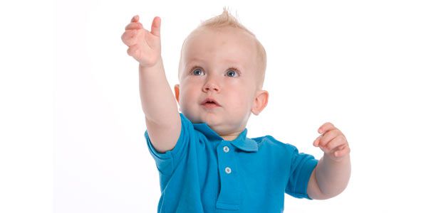 Toddler grabbing with his hand